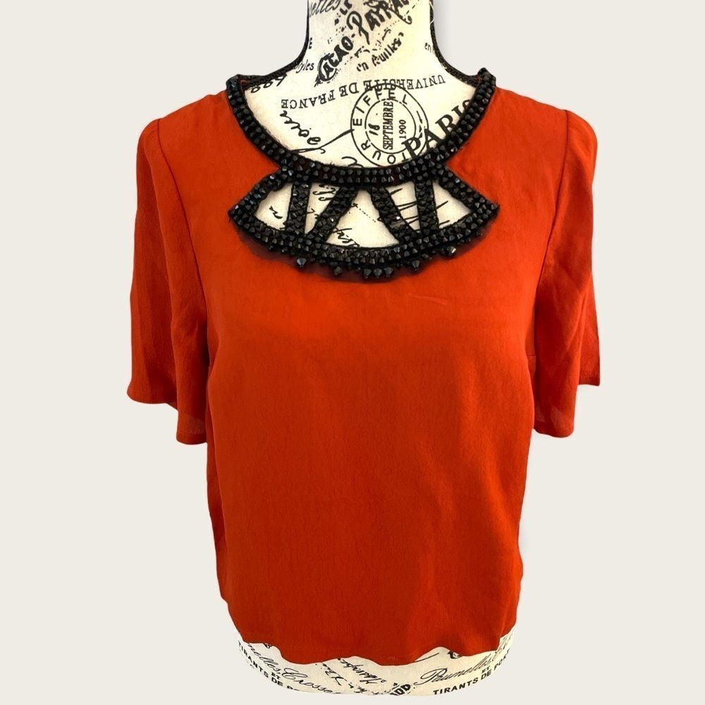 NWT Anthropologie Plenty pumpkin color blouse black embellished beading S